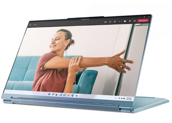 Lenovo Yoga 9i in presentation mode, showing a lady doing yoga at home.