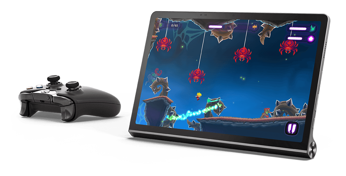 Lenovo Yoga Tab 11 tablet—front view with an adventure game on the display and a wireless game controller next to the tablet